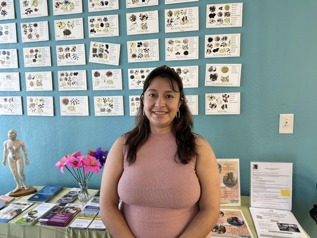 A young woman participating in a Charlotte Maxwell Clinic workshop