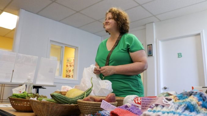 A Charlotte Maxwell volunteer teaching a workshop